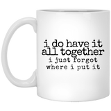 have it all together black Mugs