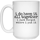 have it all together black Mugs