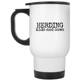 herding kids and cows black Mugs