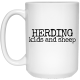 herding kids and sheep black Mugs